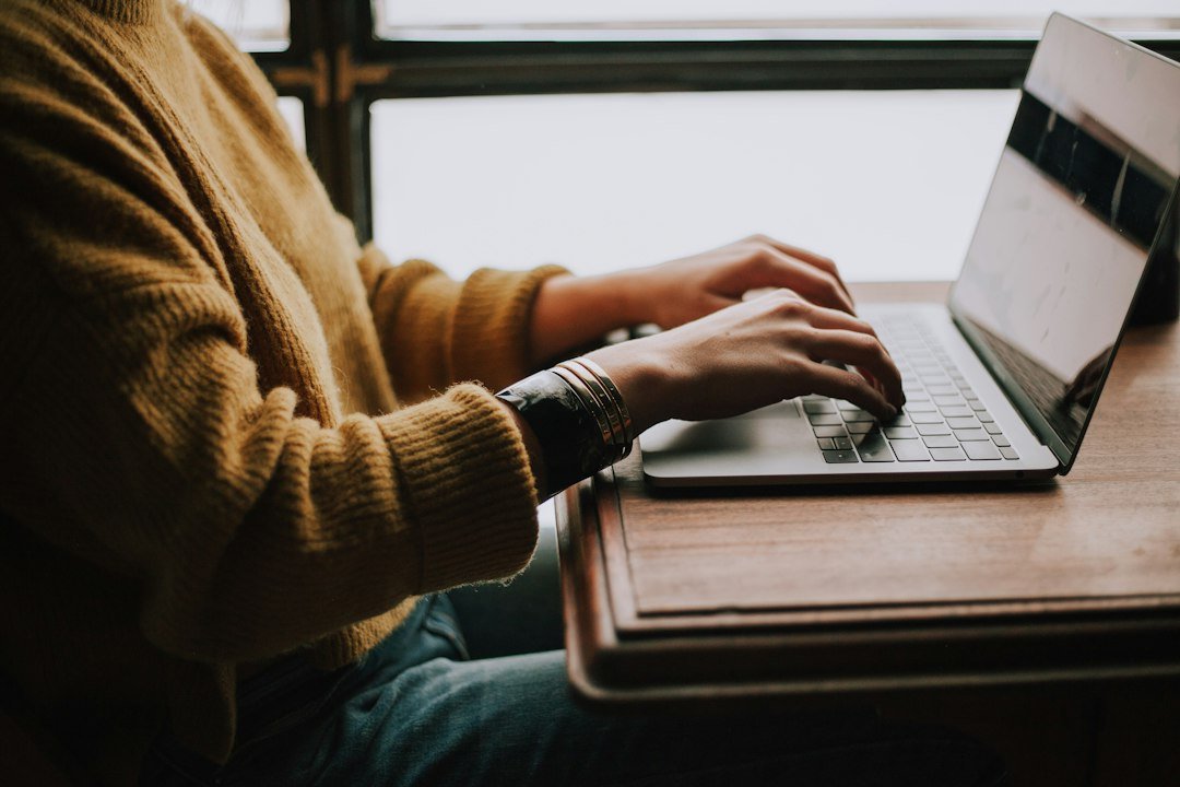 Local business owner reviewing their website on a laptop